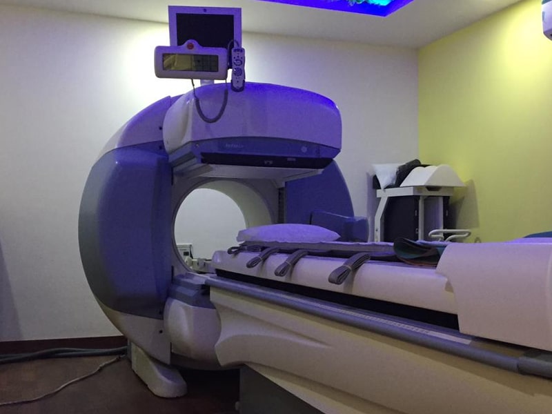 Senior Nuclear Medicine Specialists reviewing Siemens PET-CT scan reports at MRI Chandigarh facility